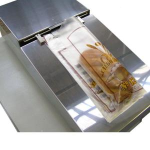 Универсальный настольный аппарат для упаковки хлеба и булочных изделий